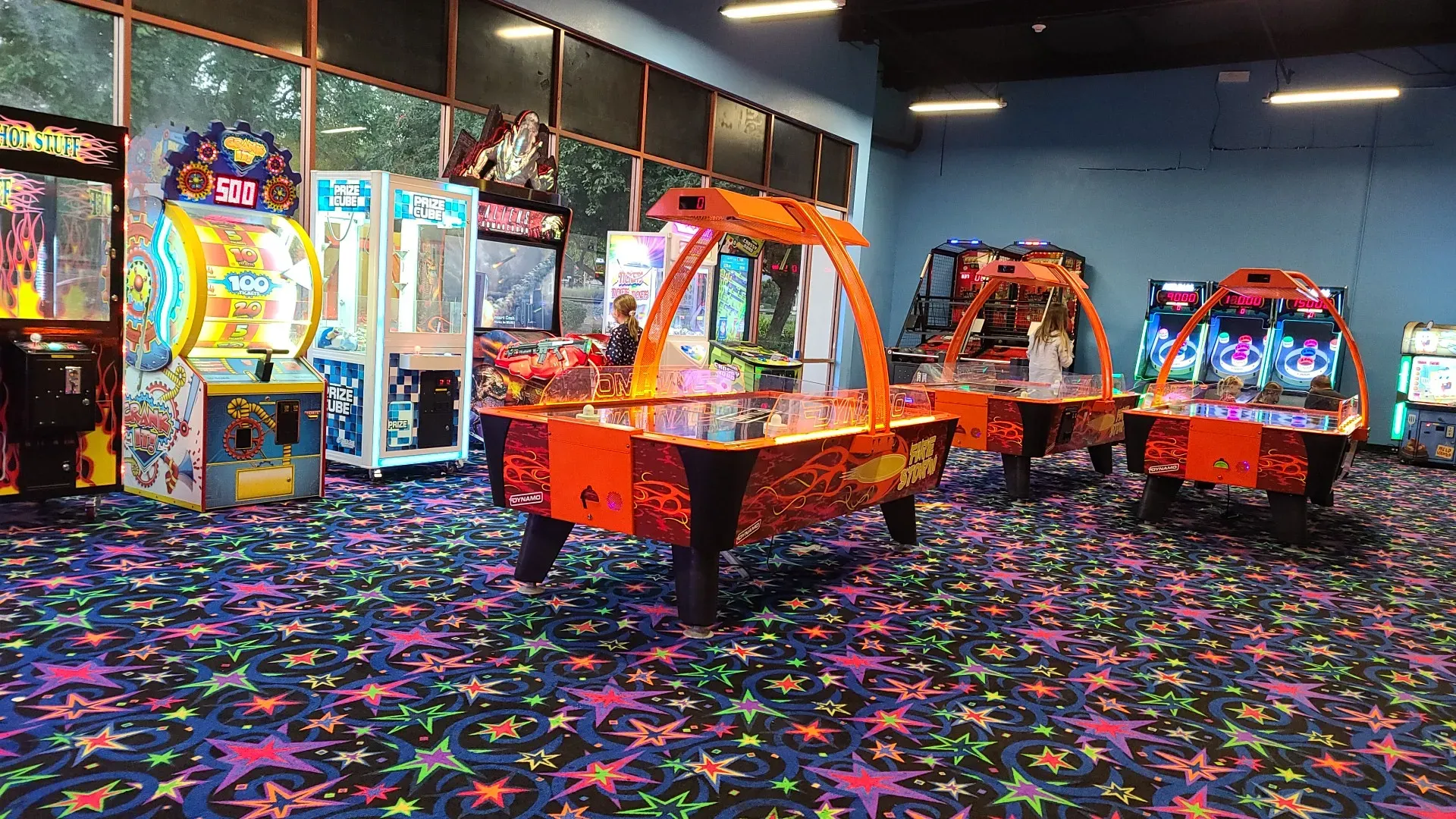 Arcade games and claw machines at SacTag Sacramento indoor entertainment center