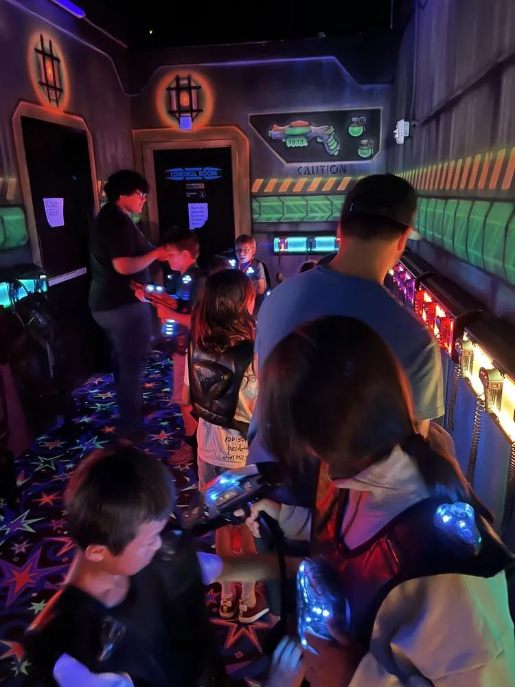 Gear up in our futuristic vesting room where every player receives professional-grade equipment. The anticipation builds here — this is where weekend warriors from Folsom to Roseville prepare for Sacramento's most intense laser tag battle. Walk-ins welcome, reservations recommended.