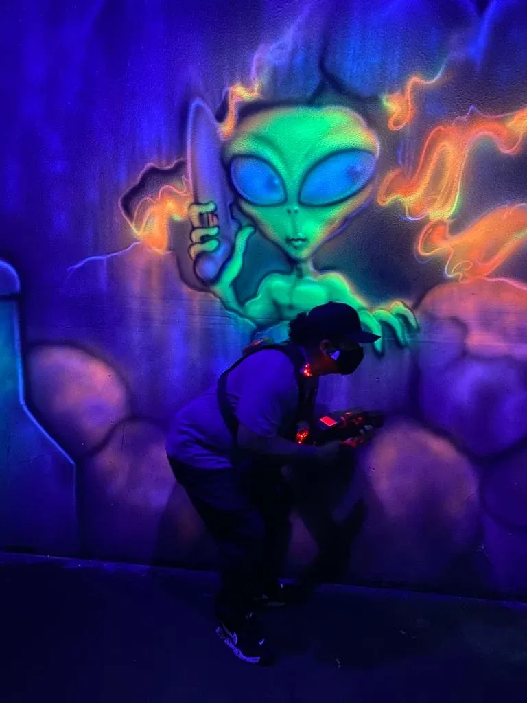 Futuristic neon-lit corridors wind through our two-story arena, creating tactical choke points and ambush zones at every turn. This is the architectural detail that separates our 8,500 sq. ft. vertical battlefield from every flat arena in the Sacramento region.