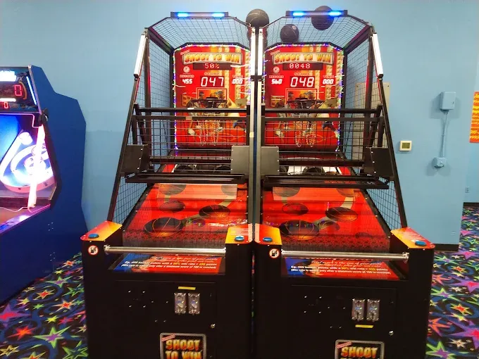 Shoot-to-win basketball arcade game machines at SacTag entertainment center.
